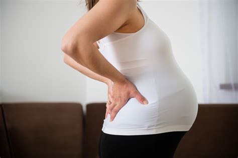 как да премахнете болката в гърба по време на бременност